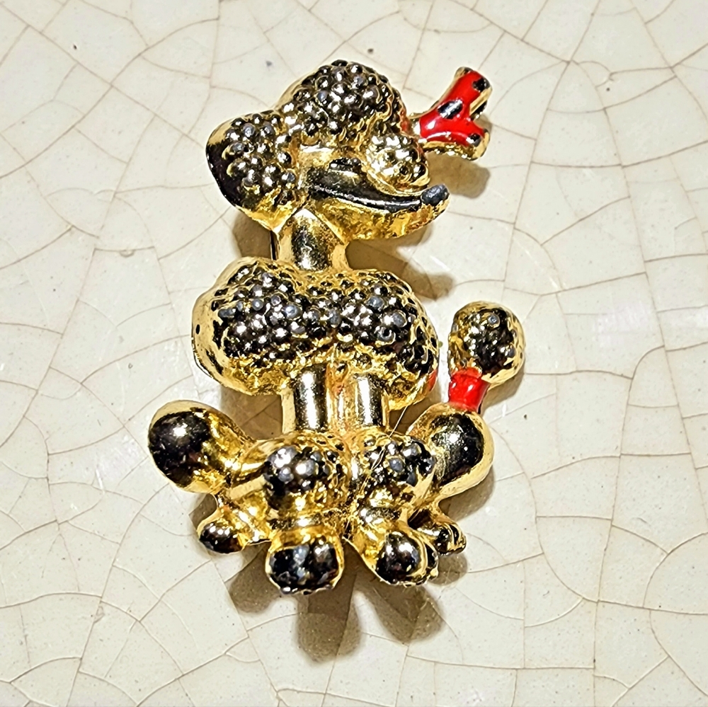 Vintage golden poodle with red bows brooch